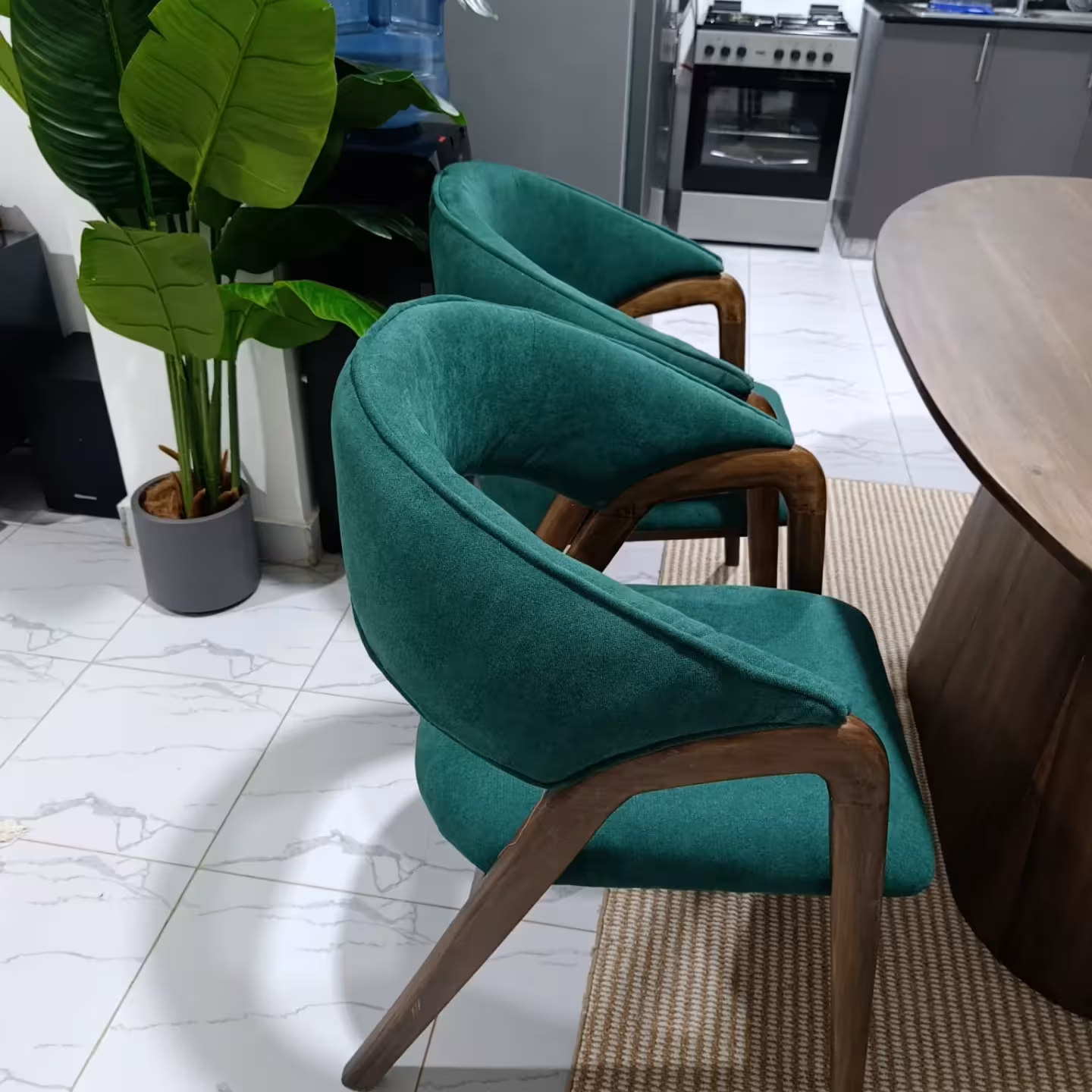 Oval Wood Table & Green Upholstered Chairs