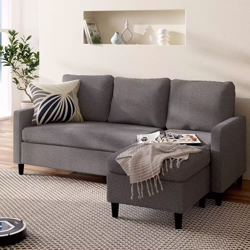 Light Grey Reversible Sectional with Ottoman