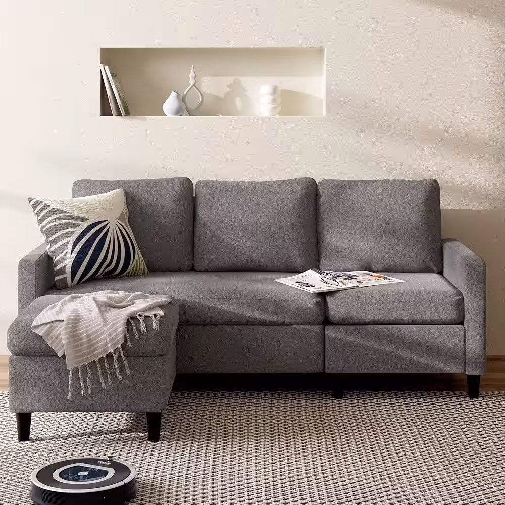 Light Grey Reversible Sectional with Ottoman